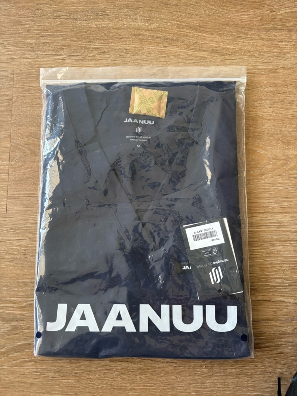 Jaanuu scrub top for women